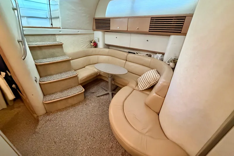 Slide: The Image of Luxurious interior of 1997 Avanti 4085 Sunbridge yacht with plush seating and elegant decor. - 13