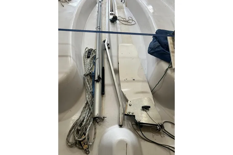 Slide: The Image of 2008 Marlow-Hunter 170 sailboat interior with rigging and ropes. - 9
