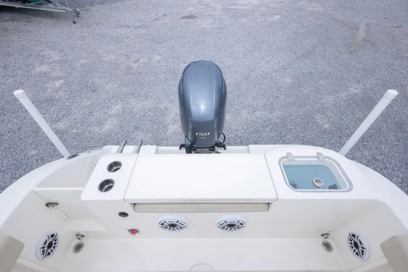 Slide: The Image of 2016 Cobia 201 Center Console boat with Yamaha 150 outboard motor. - 23