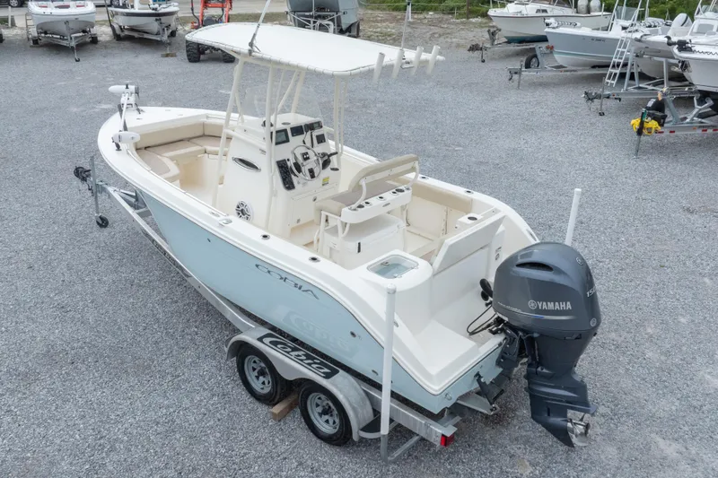 Slide: The Image of 2016 Cobia 201 Center Console boat with Yamaha engine on trailer. - 45