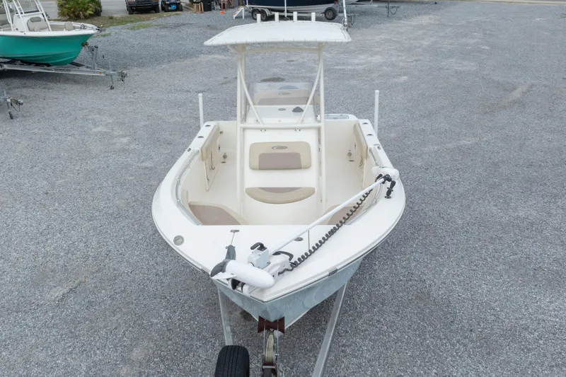Slide: The Image of 2016 Cobia 201 Center Console boat on gravel lot, front view. - 5