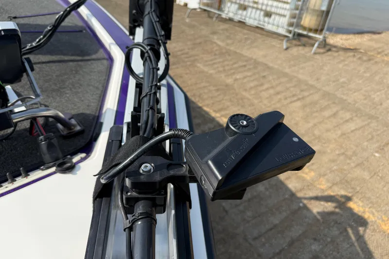 Slide: The Image of Close-up of a 2002 Bullet 21XDC boat's trolling motor mount and wiring. - 45