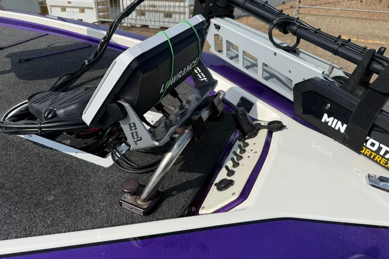 Slide: The Image of 2002 Bullet 21XDC boat dashboard with Lowrance and Minn Kota equipment. - 46