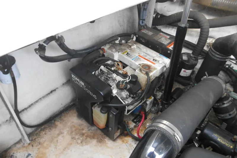 Slide: The Image of Engine compartment of a 2005 Sea Ray 340 Sundancer with Kohler power systems. - 19