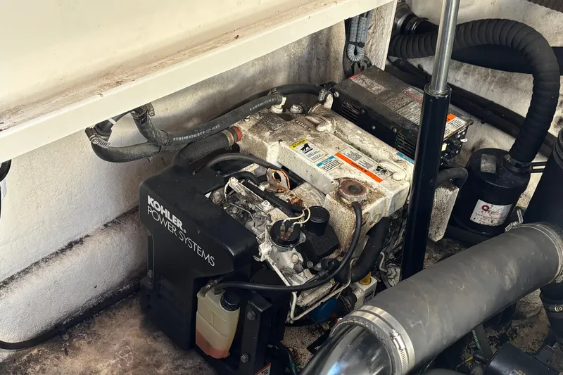 Slide: The Image of Engine compartment of a 2005 Sea Ray 340 Sundancer with Kohler power system. - 25