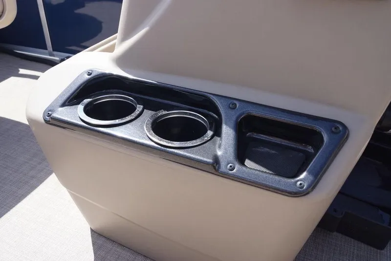 Slide: The Image of Cup holders on 2025 Sun Tracker Bass Buggy 18 DLX boat interior. - 10