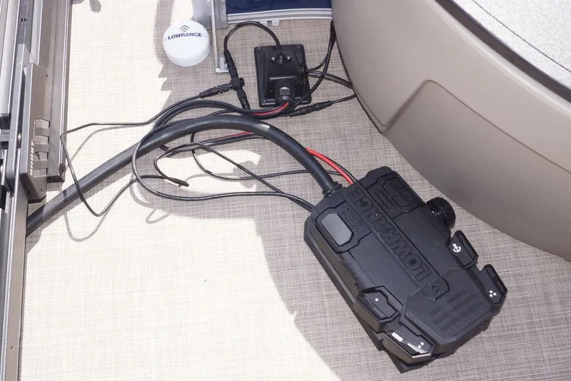 Slide: The Image of Lowrance equipment installed on 2025 Sun Tracker Bass Buggy 18 DLX boat deck. - 19