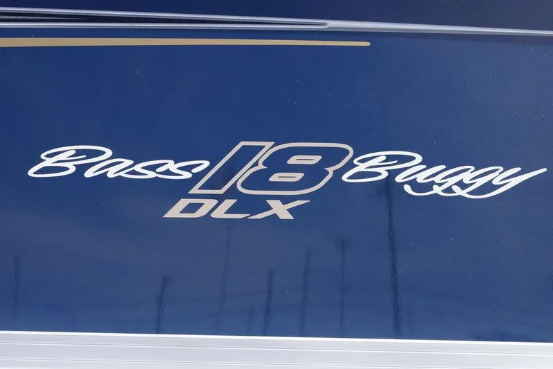 Slide: The Image of 2025 Sun Tracker Bass Buggy 18 DLX logo on blue background. - 7