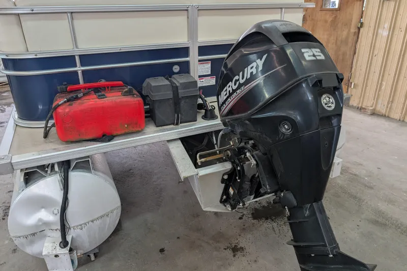 Slide: The Image of 2016 SunChaser Oasis Fish 816 with Mercury outboard motor and fuel tank. - 3