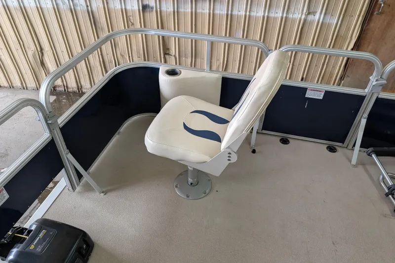 Slide: The Image of 2016 SunChaser Oasis Fish 816 boat interior with swivel seat and railing. - 4