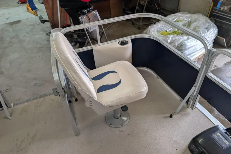 Slide: The Image of SunChaser Oasis Fish 816 boat seat, 2016 model, in a workshop setting. - 5