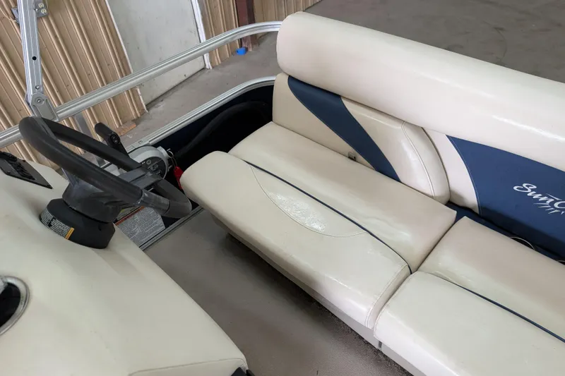 Slide: The Image of Interior of 2016 SunChaser Oasis Fish 816 pontoon boat with steering wheel and seating. - 8