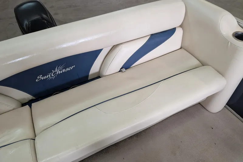 Slide: The Image of SunChaser Oasis Fish 816 boat seat, 2016 model, featuring beige and blue upholstery. - 9