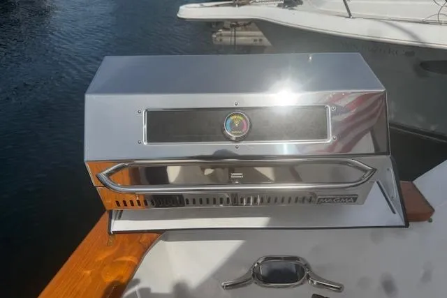 Slide: The Image of Stainless steel grill on 1993 Ocean Alexander 440 Sundeck CPMY yacht deck. - 13