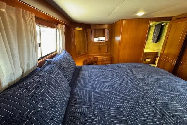 Slide: The Image of Luxurious cabin interior of 1993 Ocean Alexander 440 Sundeck CPMY yacht. - 25
