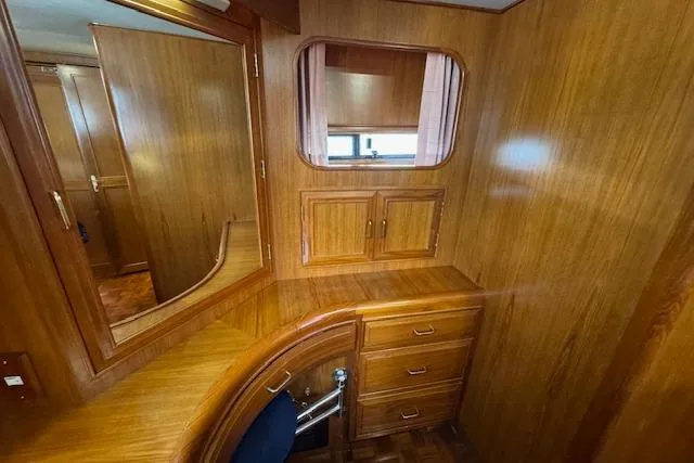 Slide: The Image of Luxurious wooden interior of 1993 Ocean Alexander 440 Sundeck CPMY yacht cabin. - 26