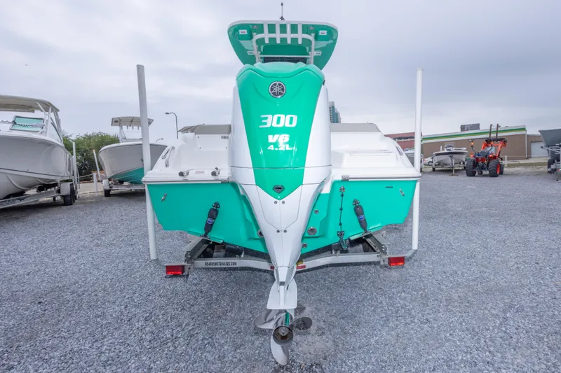 Slide: The Image of 2023 Key West 239 FS boat with powerful 300 V6 engine, displayed on a trailer. - 14