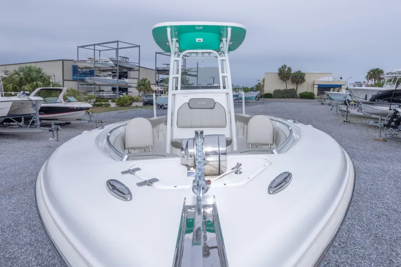 Slide: The Image of 2023 Key West 239 FS boat displayed in a marina setting. - 19