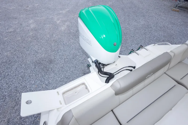 Slide: The Image of 2023 Key West 239 FS boat with Yamaha outboard motor, featuring spacious seating. - 25