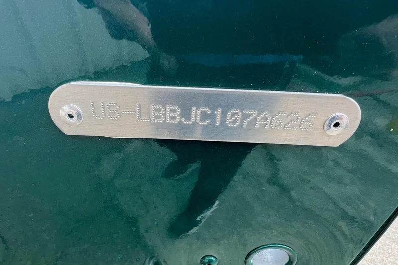 Slide: The Image of 2026 Lund 1400 Fury SS boat identification plate with serial number. - 18