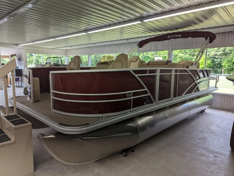 The Image of 2023 Sylvan Mirage Fish 8520 Party Fish pontoon boat in showroom. - 0