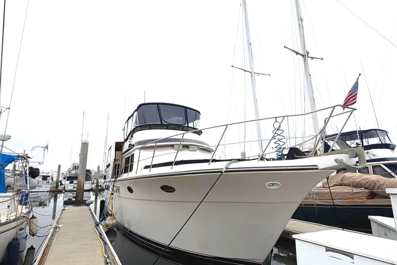 The Image of 1989 45' Californian Aft Cabin Motor Yacht docked at marina. - 0