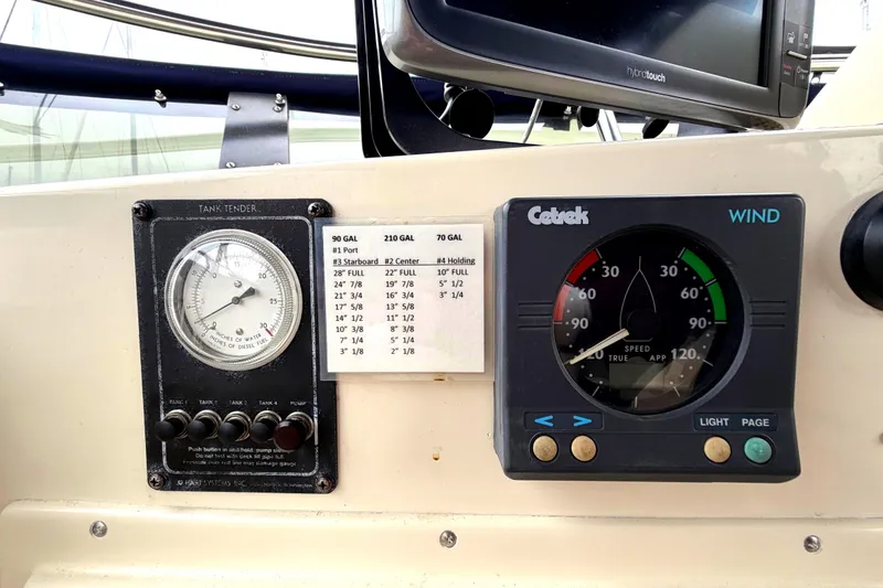 Slide: The Image of Control panel of a 1989 45' Californian Aft Cabin Motor Yacht with gauges and indicators. - 15