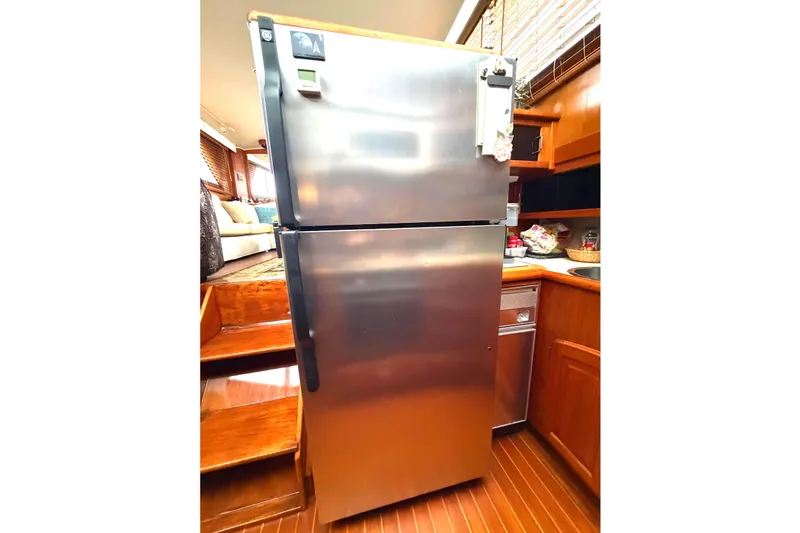 Slide: The Image of Stainless steel refrigerator in 1989 45' Californian Aft Cabin Motor Yacht kitchen. - 30