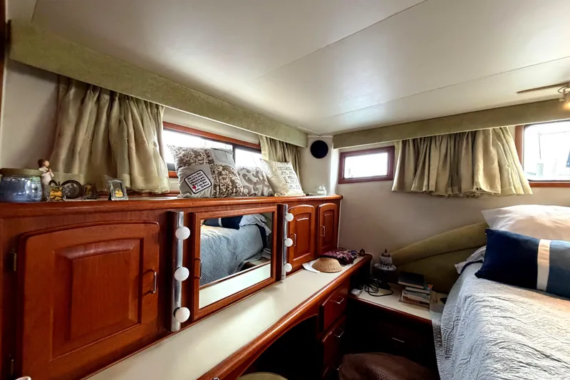 Slide: The Image of Cozy cabin interior of 1989 45' Californian Aft Cabin Motor Yacht with wooden cabinetry. - 36