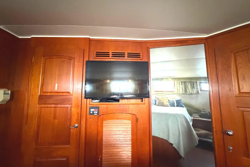 Slide: The Image of Interior of 1989 45' Californian Aft Cabin Motor Yacht with TV and mirror. - 39