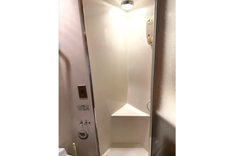 Slide: The Image of Shower area in 1989 45' Californian Aft Cabin Motor Yacht, featuring modern fixtures. - 44