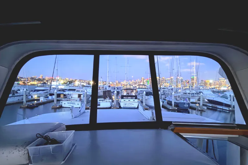 Slide: The Image of View from 1989 45' Californian Aft Cabin Motor Yacht overlooking marina at dusk. - 49