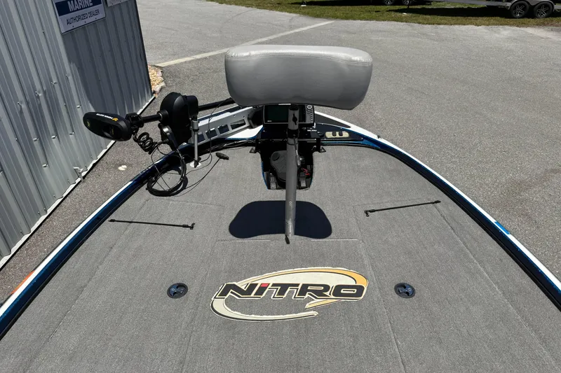 Slide: The Image of 2017 Nitro Z18 boat deck with seat and trolling motor. - 10