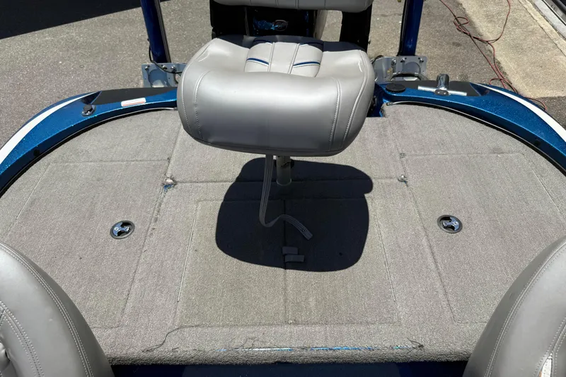 Slide: The Image of 2017 Nitro Z18 boat deck with gray seating and carpeted flooring. - 14