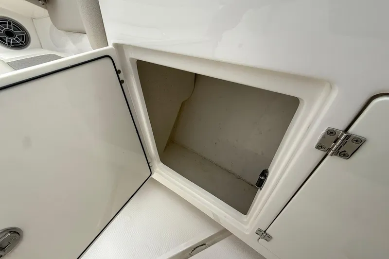 Slide: The Image of Open storage compartment on a 2022 Solace 41CS boat, showcasing interior space. - 15