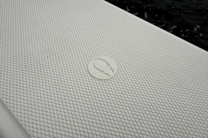 Slide: The Image of Textured deck of 2022 Solace 41CS boat with logo detail. - 21