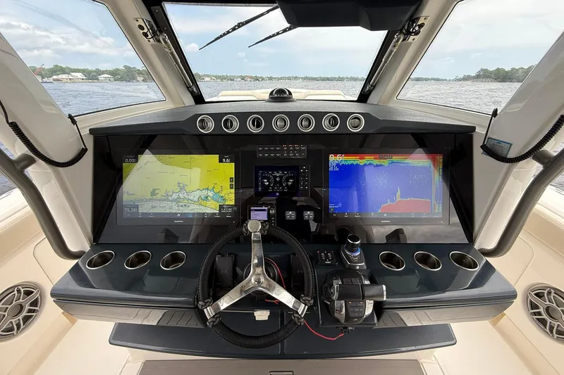 Slide: The Image of Cockpit of 2022 Solace 41CS boat with advanced navigation and control systems. - 24