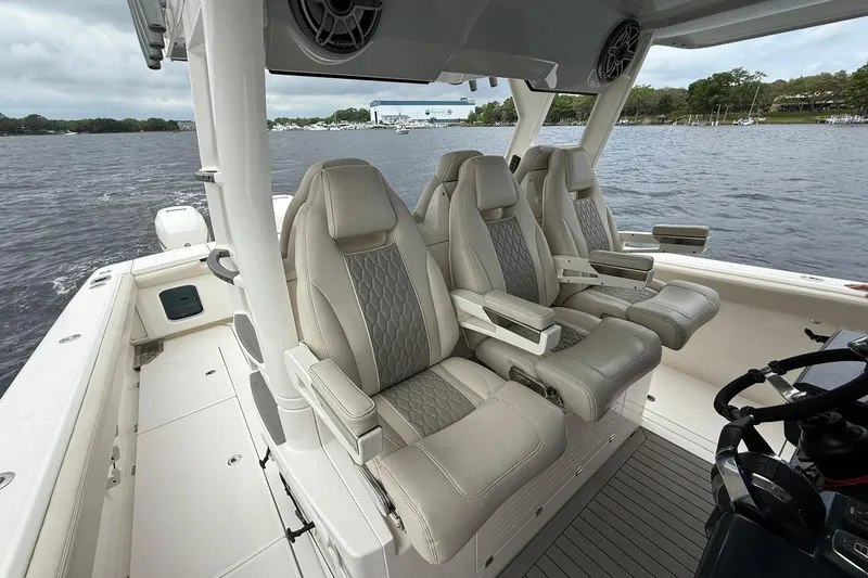 Slide: The Image of Luxurious seating on 2022 Solace 41CS boat, featuring elegant design and comfortable armrests. - 31