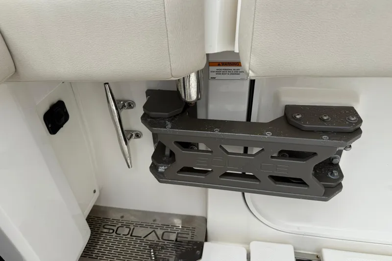 Slide: The Image of 2022 Solace 41CS boat interior detail with metal hardware and warning label. - 51