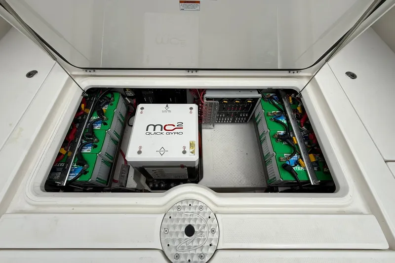 Slide: The Image of 2022 Solace 41CS boat engine compartment with MC² Quick Gyro stabilizer and batteries. - 52
