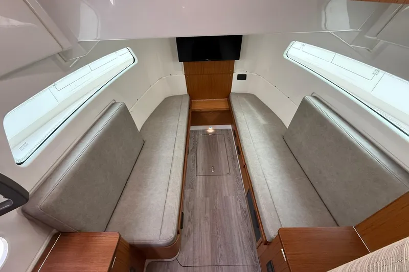 Slide: The Image of Interior of 2022 Solace 41CS boat with sleek seating and modern design. - 61