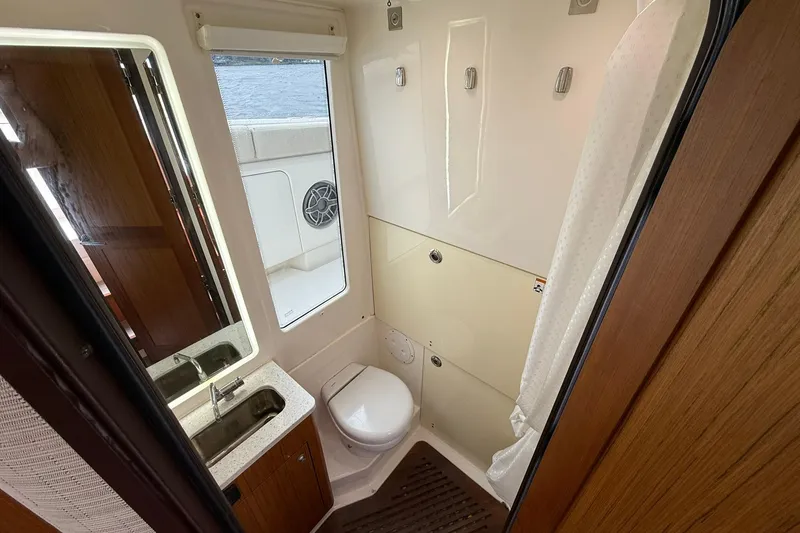 Slide: The Image of Luxurious bathroom in 2022 Solace 41CS boat, featuring modern fixtures and elegant design. - 70