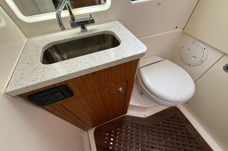 Slide: The Image of Compact bathroom in 2022 Solace 41CS boat with sink and toilet. - 71