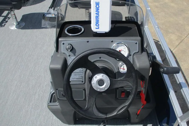 Slide: The Image of Steering console of 2026 Sun Tracker Bass Buggy 18 DLX with Lowrance fish finder. - 6
