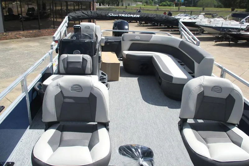 Slide: The Image of 2026 Sun Tracker Bass Buggy 18 DLX pontoon boat with spacious seating and modern design. - 9