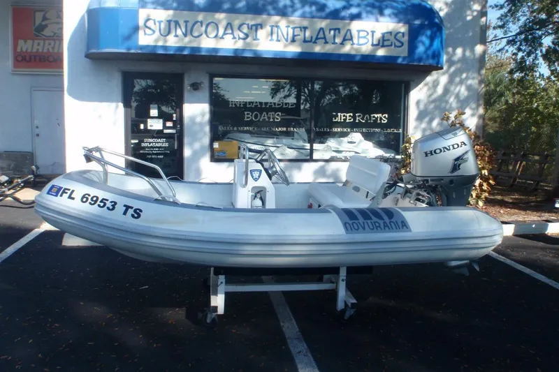 Slide: The Image of 2007 Novurania Deluxe 335 inflatable boat with Honda outboard motor at Suncoast Inflatables. - 3