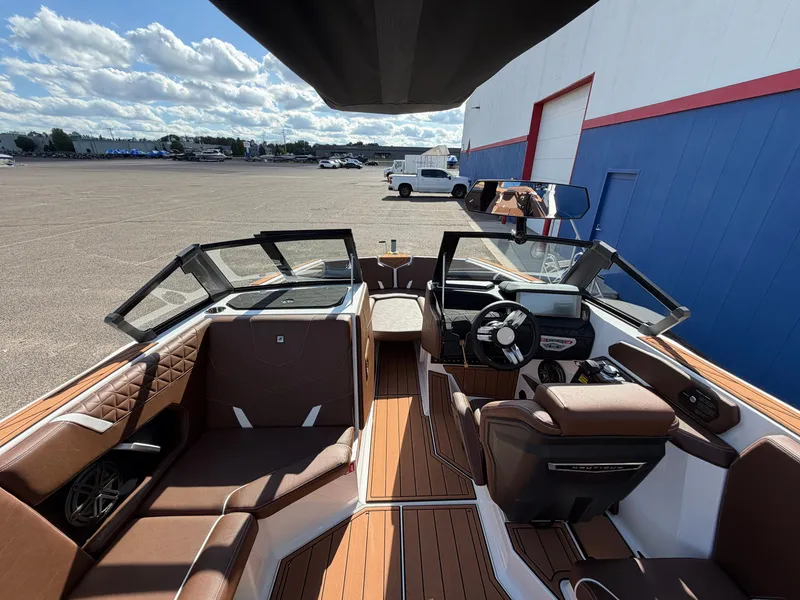 Slide: The Image of The image shows the interior of a 2027 Nautique GS22 Super Air boat with luxurious seating and modern design. - 26