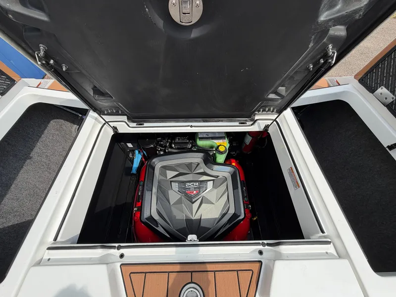 Slide: The Image of The engine compartment of a 2027 Super Air Nautique GS24 with a PCM engine is visible. - 17