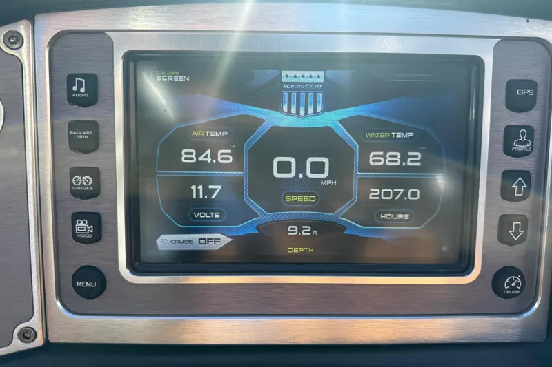 Slide: The Image of Dashboard of a 2017 MasterCraft X-46 boat displaying temperature, speed, and depth. - 10