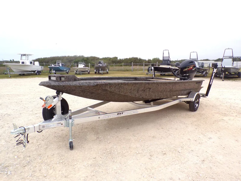 Slide: The Image of 2026 Xpress X18DB boat on trailer, parked outdoors. - 11